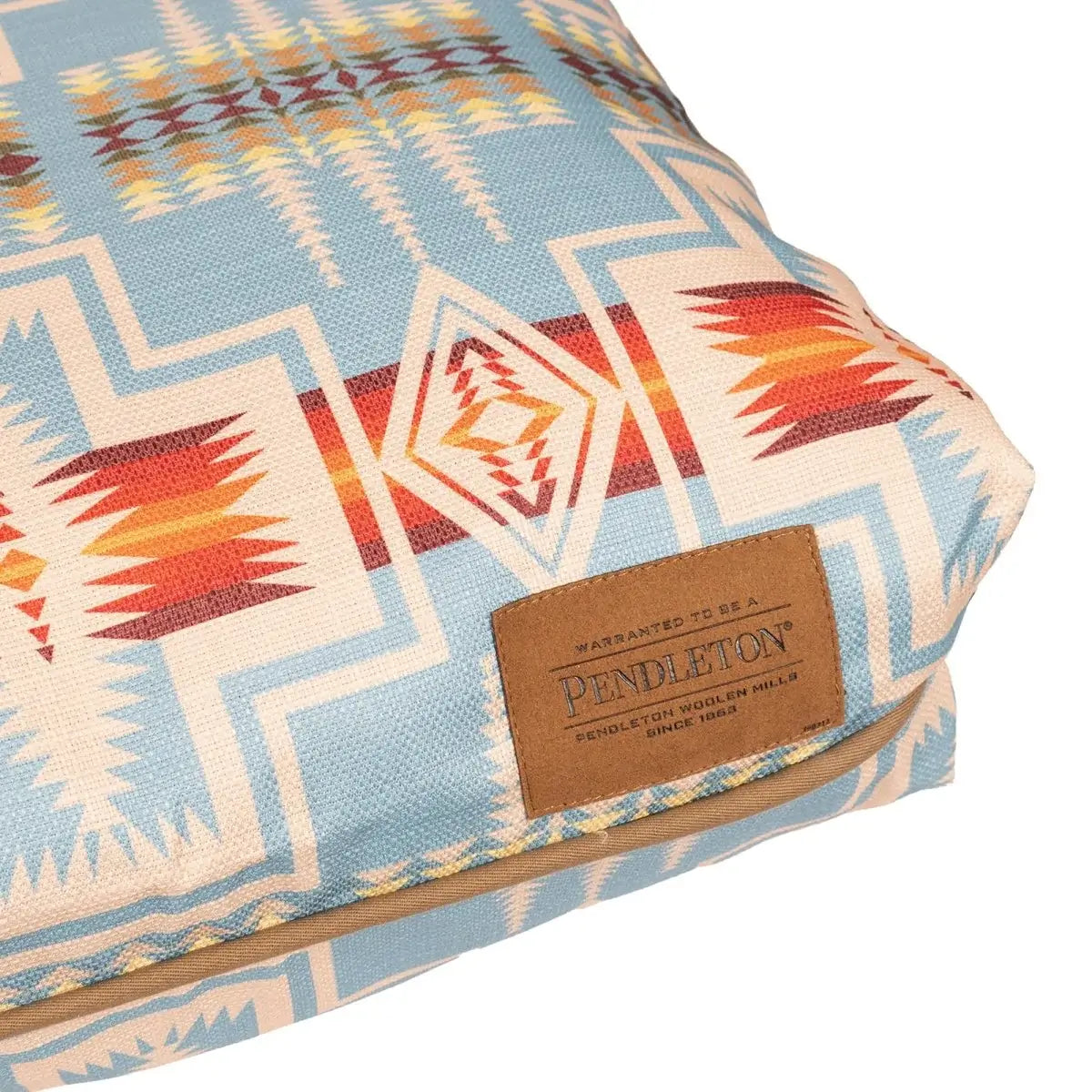 Pendleton dog bed with colorful geometric pattern and leather label, indoor/outdoor durable pet napper