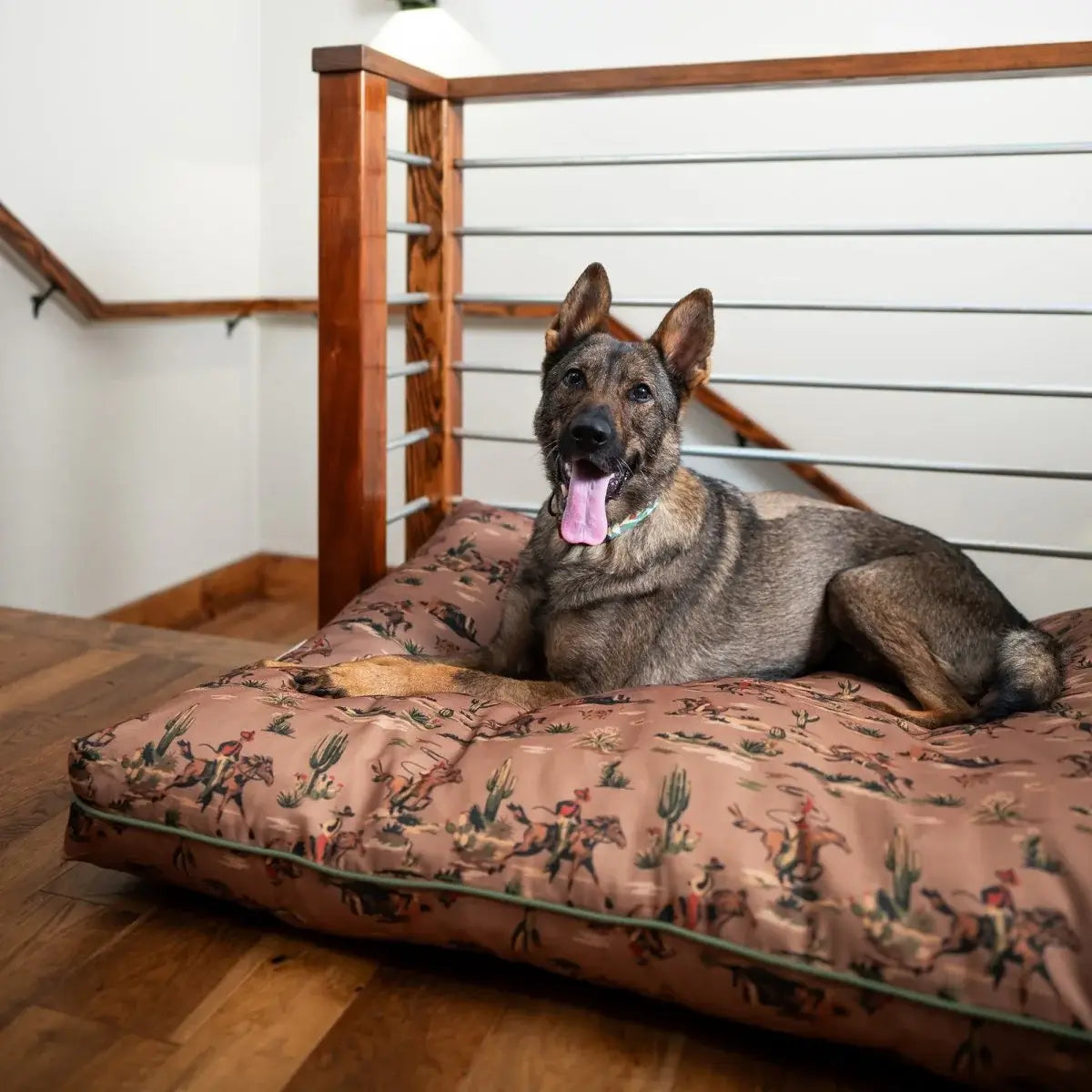 pendleton dog bed with water-resistant fabric featuring southwestern print and a dog lying on it indoors